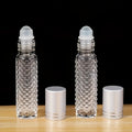 two refillable glass ball bottles designed cosmetics