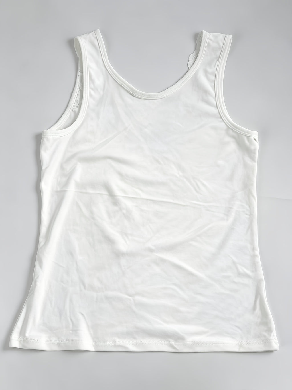 new lace trimmed spaghetti strap top versatile
